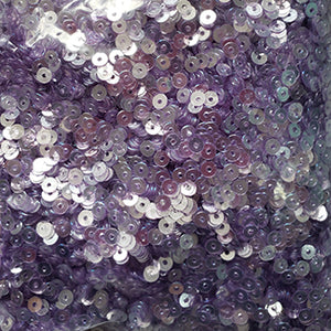materiales para bordar a mano en pedrería: lentejuelas planas de color morado violeta claro brillante